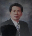 제 21대 김원근 교장 사진